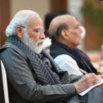 PM Modi taking notes during a Council of Ministers meeting