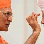 Acharya Shree Jitendriyapriyadasji Swamiji Maharaj, spiritual leader of Maninagar Shree Swaminarayan Gadi Sansthan blessing PM Modi