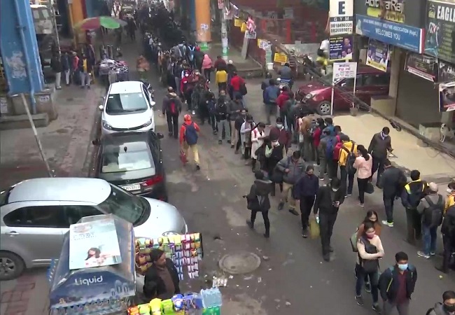 Delhi: Long queues outside metro stations and bus stands due to new COVID-19 norms