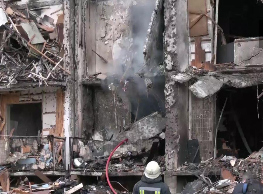 Ukrainian forces downed an enemy aircraft over Kyiv in the early hours on Friday, which then crashed into a residential building and set it on fire