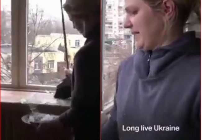 War in Ukraine: Teary-eyed Ukrainian woman sings national anthem while cleaning bombarded home (WATCH VIDEO)