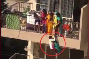 Shocking! Mother hangs son from 10th floor to fetch fallen saree in Faridabad- Viral Video