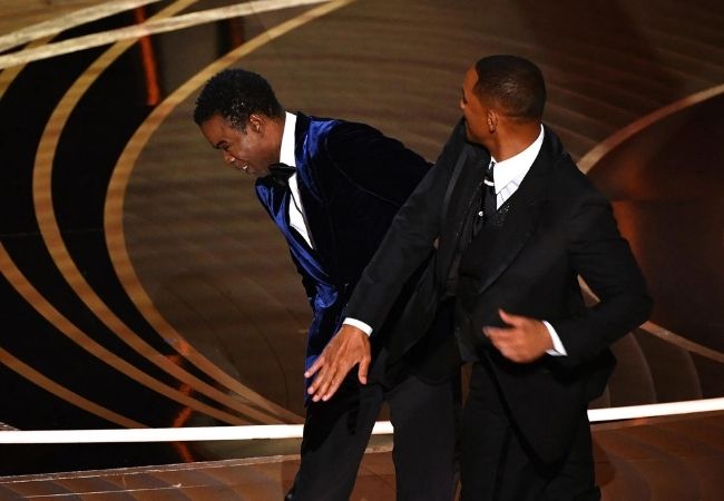 Will Smith slaps Chris Rock for tasteless comment about wife; netizens react with memes & jokes