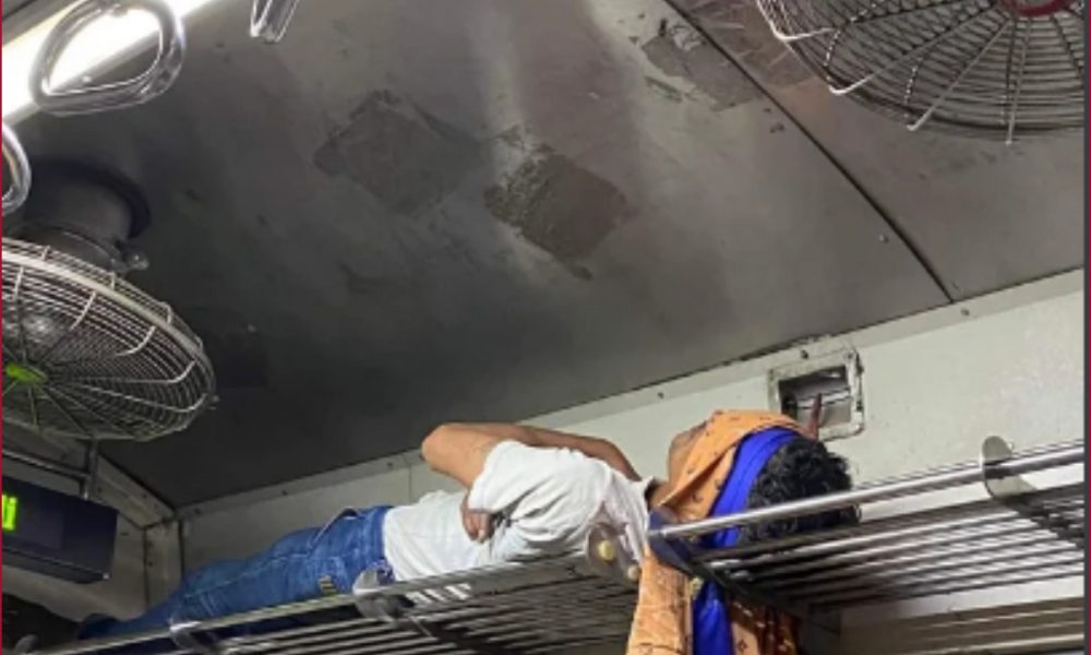 Daredevil Act: Mumbai man goes viral for sleeping on luggage rack in photo
