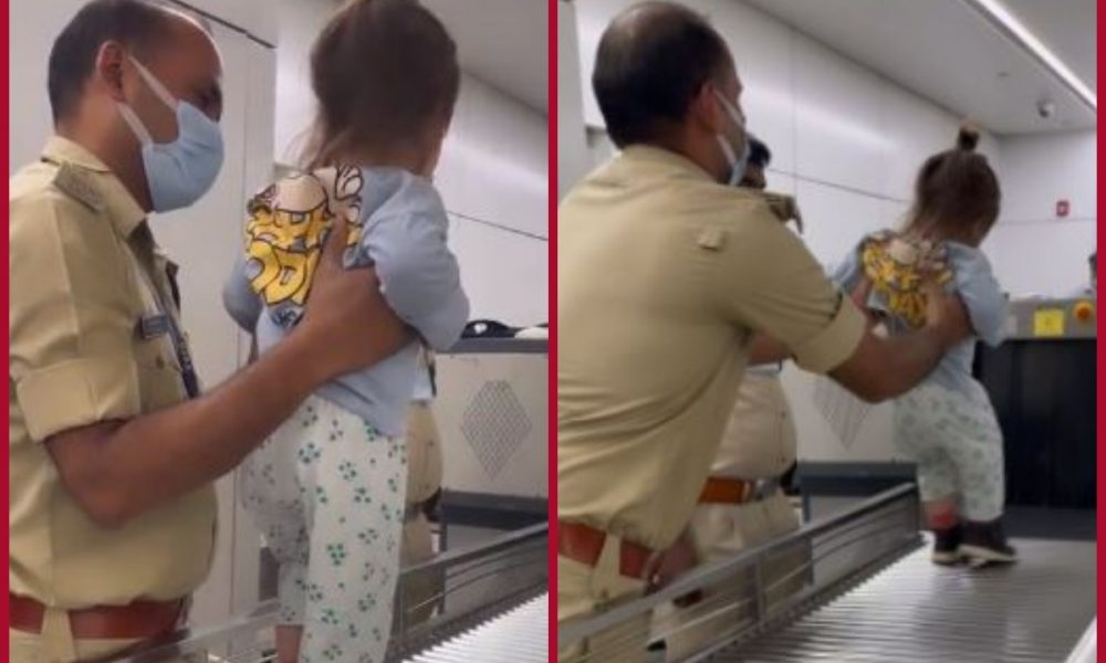 Netizens shower love on CISF officer for playing with toddler at Delhi Airport; watch viral video here