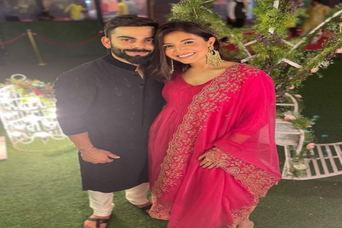 Anushka-Virat pose for a happy picture at fellow player Glenn Maxwell’s wedding reception