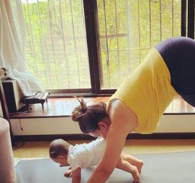 Neha Dhupia does yoga with son Guriq