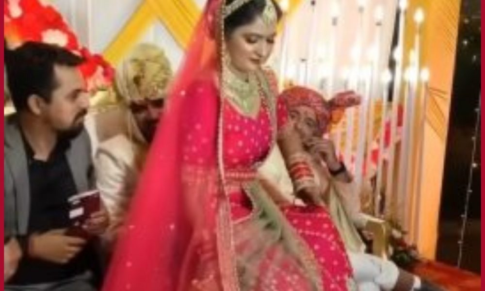Bride’s swag goes viral: Sits on groom’s lap as no space left by friends on wedding sofa