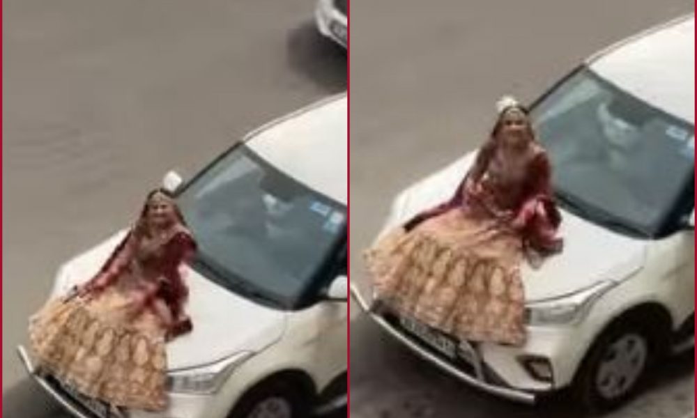 Girl proposes to partner sitting on car’s bonnet; video goes viral 