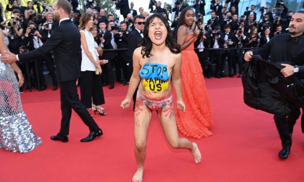 At the premiere of Cannes 2022, a topless protestor shatters the red carpet