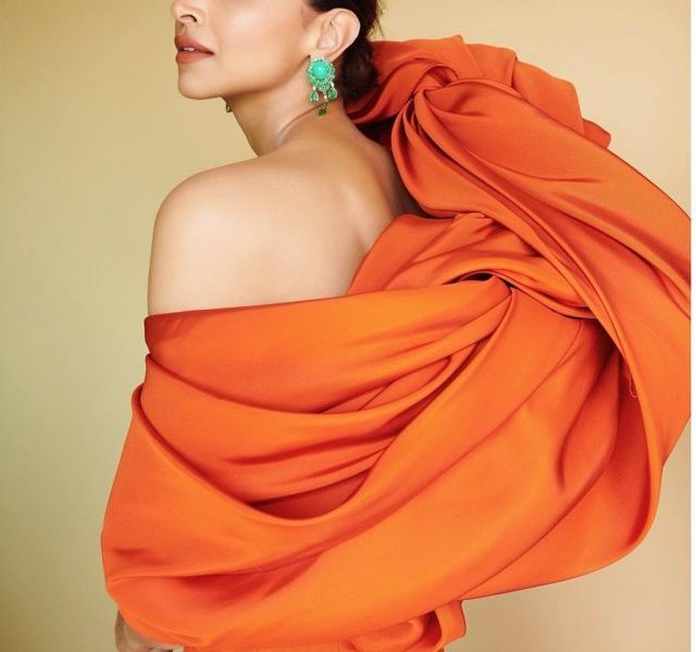 Deepika Padukone shines bright in one-shoulder striking orange gown