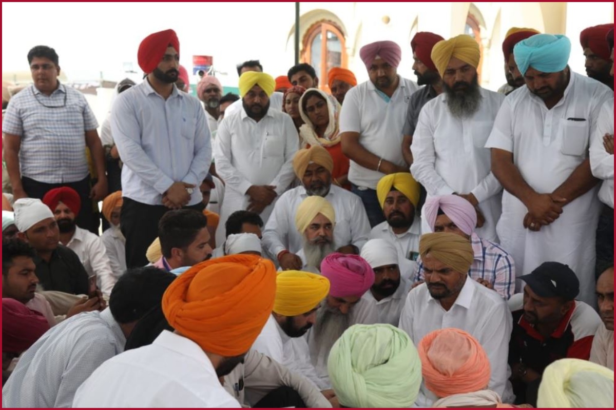 Punjab CM Bhagwant Mann meets family of singer Sidhu Moose Wala at his residence in Mansa