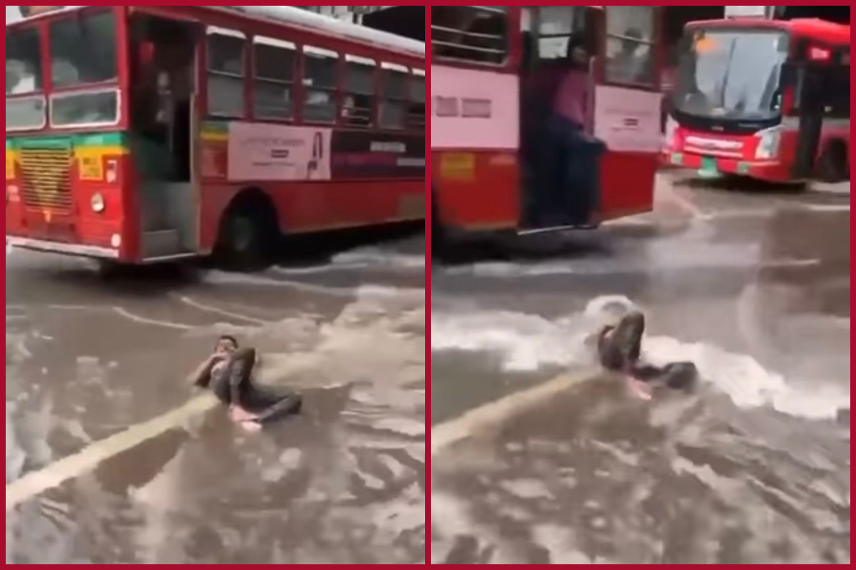 Man lies on waterlogged Mumbai road sending out Maldives vibes; Netizens feel amused
