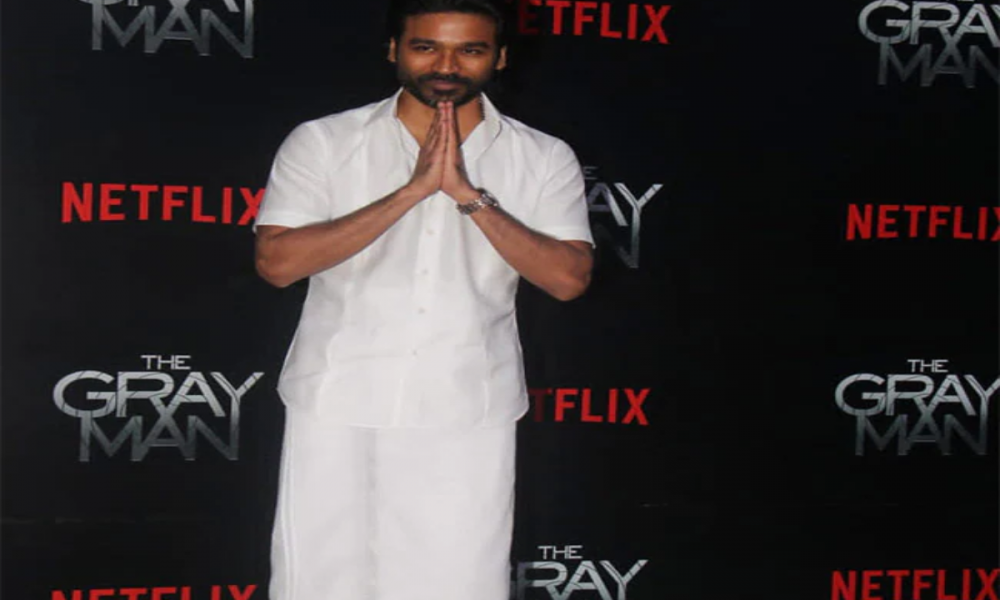 Dhanush wears traditional white mundu to The Gray Man’s Mumbai premiere, hugs Vicky Kaushal