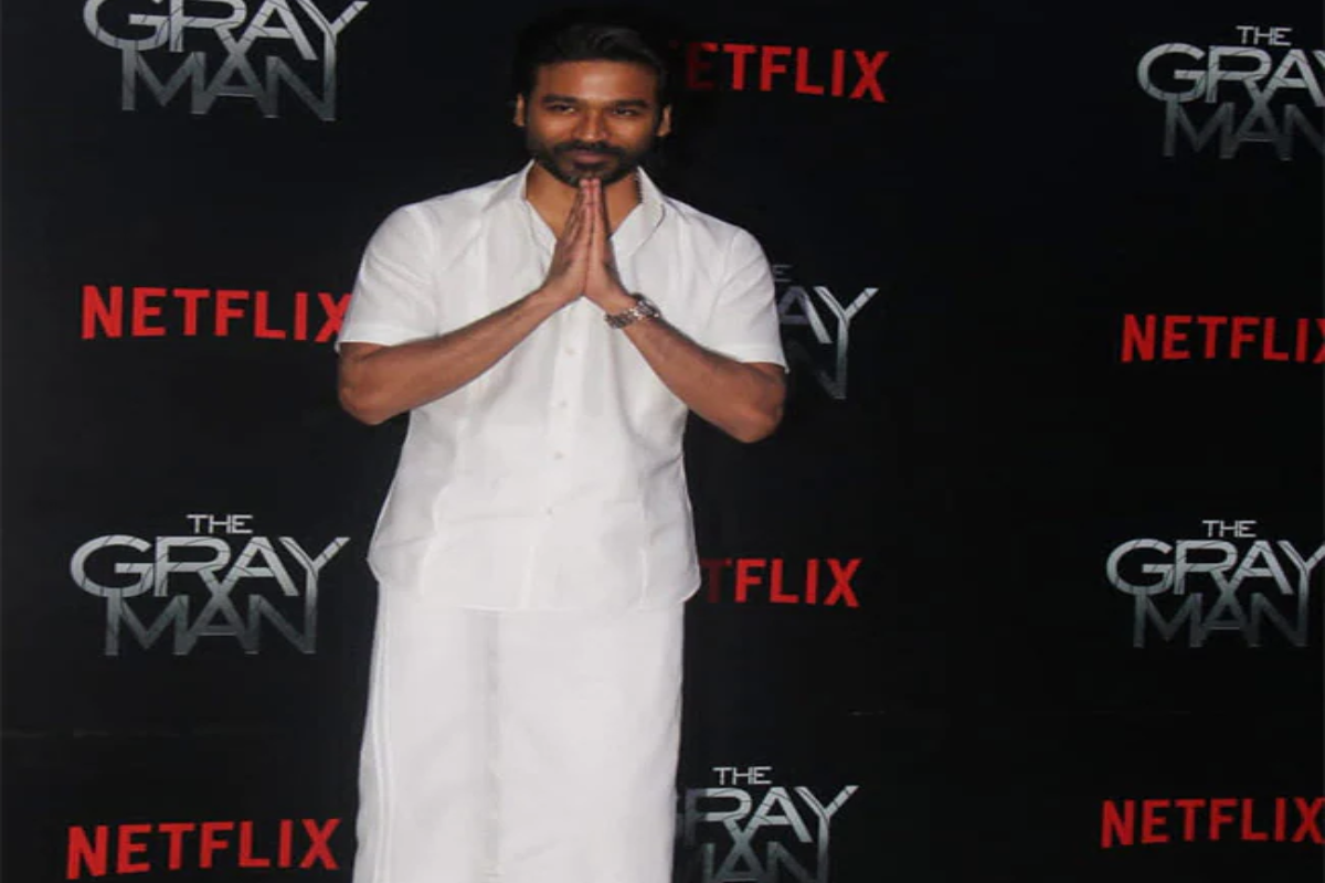 Dhanush wears traditional white mundu to The Gray Man’s Mumbai premiere, hugs Vicky Kaushal