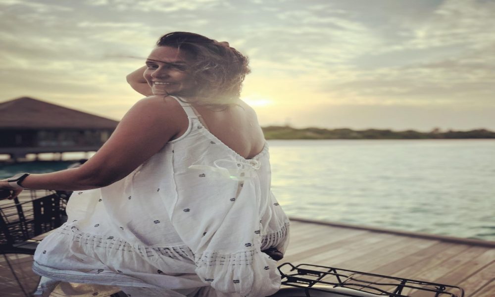 Neha Dhupia shares pic of herself lounging by the ocean