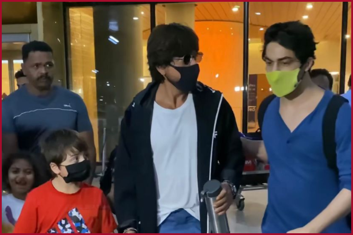 SRK unhappy with fan’s behaviour who forcefully tried clicking selfie; Netizens laud how Aryan Khan tackled