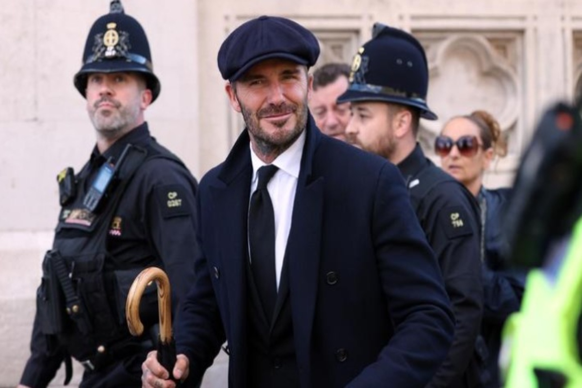 For 12 hours, David Beckham waited in line to view the queen lying in state; Watch