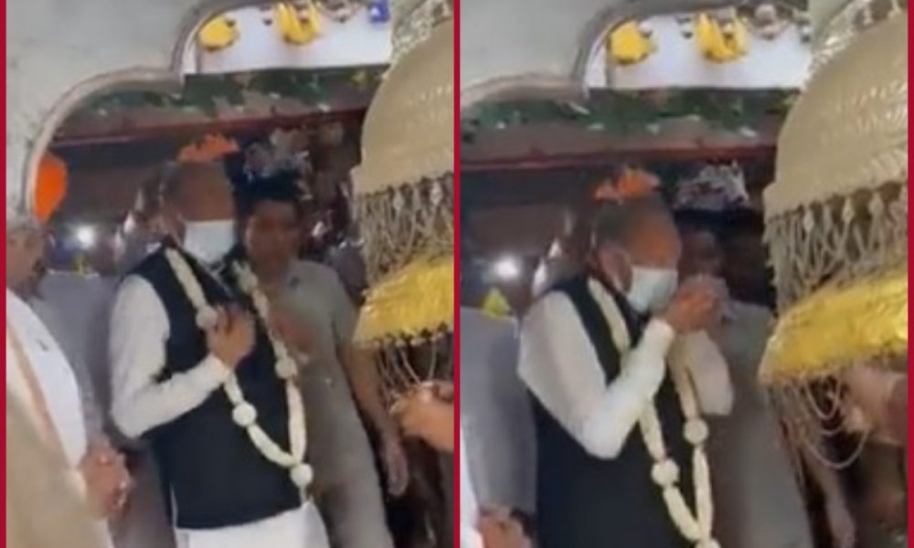 CM Gehlot gets trolled on social media for drinking holy water with mask (WATCH)