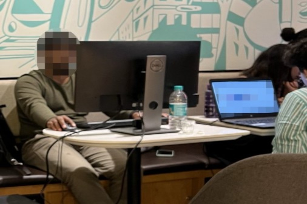 Viral photo from Bengaluru: Man takes desktop to coffee shop, as office ‘flooded’ with rain water