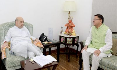 cm dhami and amit shah