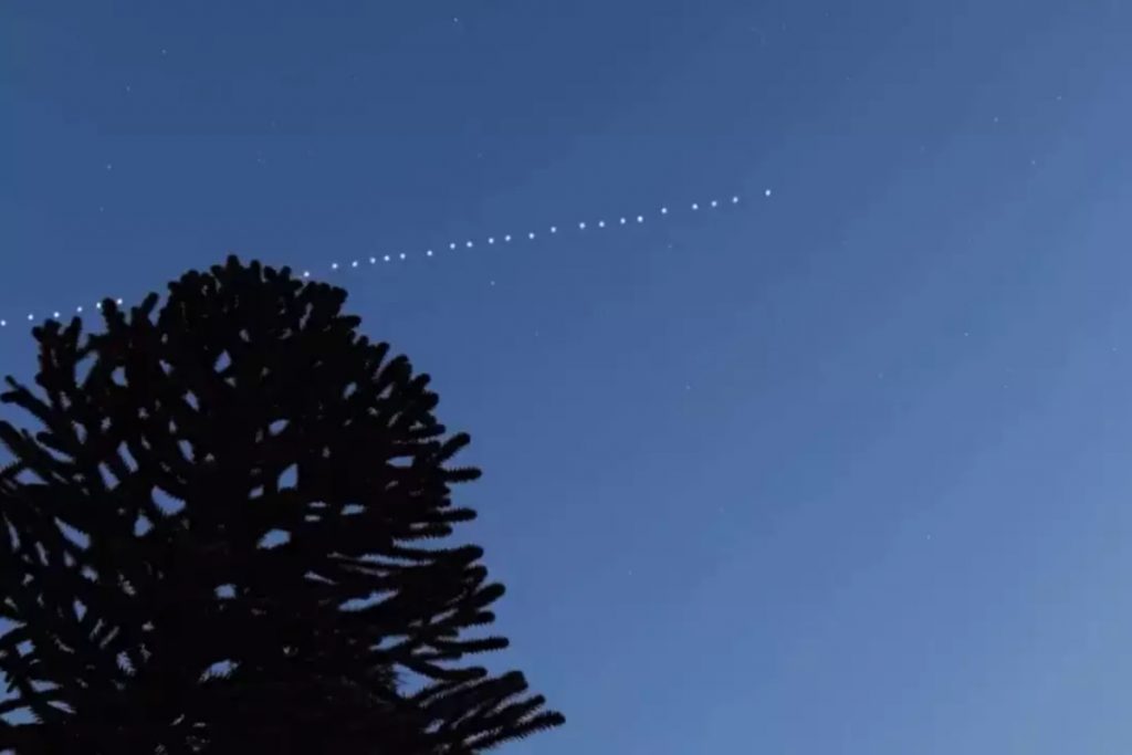 Mysterious string of light spotted in night sky at various cities of