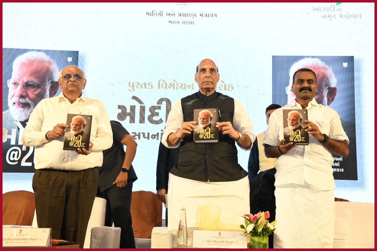 Rajnath Singh releases Gujarati edition of Modi @20 book in Gandhinagar