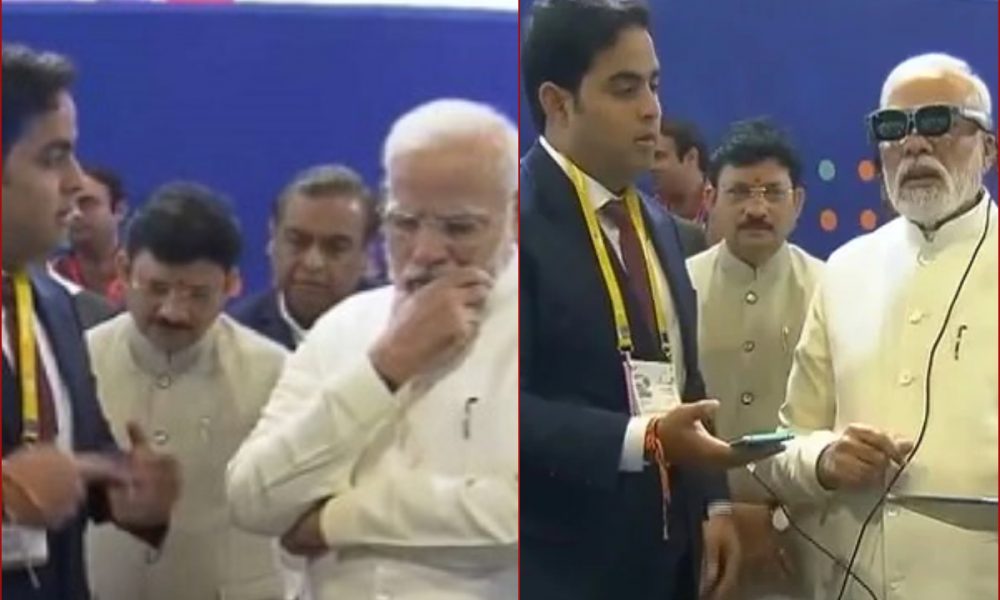 VIDEO: Mukesh and Akash Ambani assist PM Modi, give 5G demo at Jio pavilion
