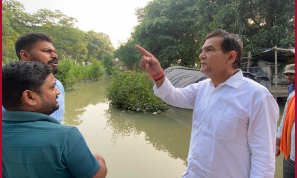 Uttar Pradesh: Urban Development Minister AK Sharma takes stock of flood-affected areas in Azamgarh district, distributes relief materials