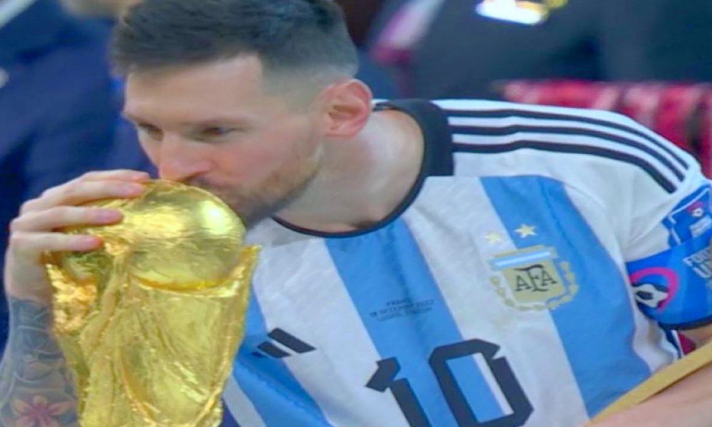 Overjoyed Lionel Messi dances atop on table with FIFA World Cup trophy (WATCH)