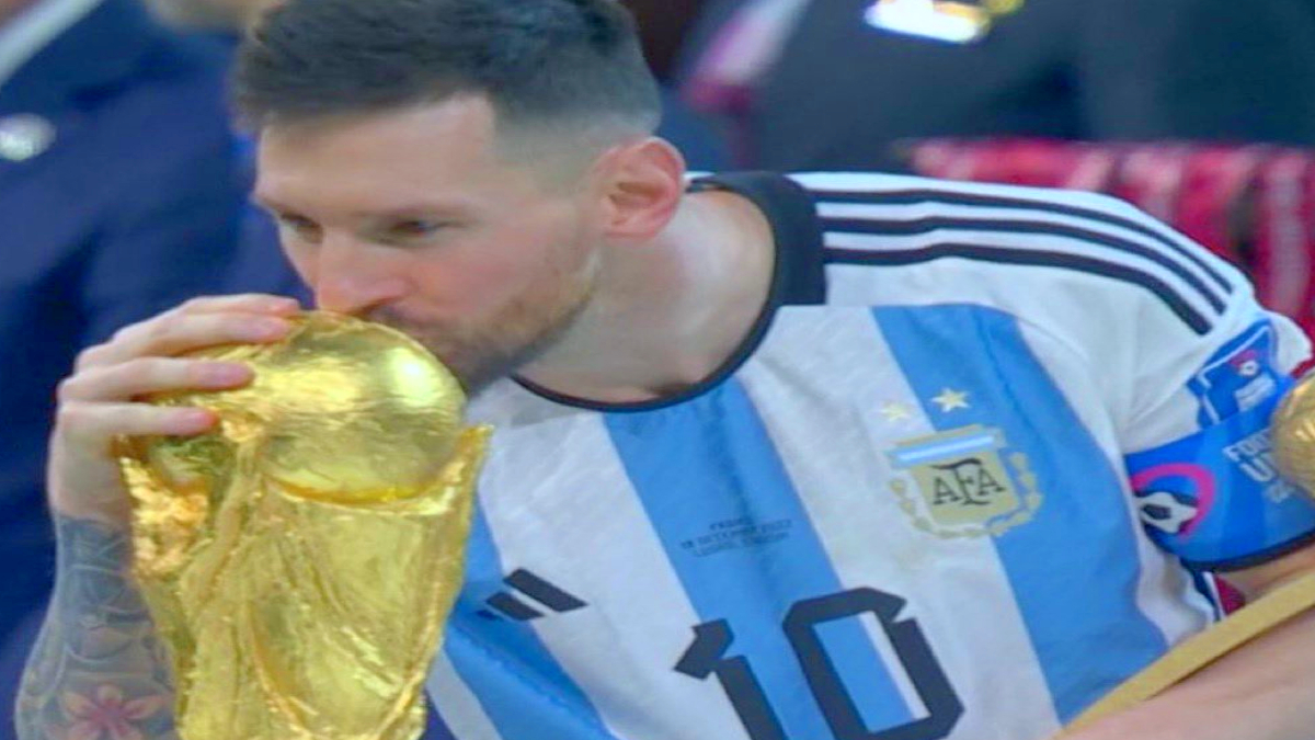 Overjoyed Lionel Messi dances atop on table with FIFA World Cup trophy (WATCH)