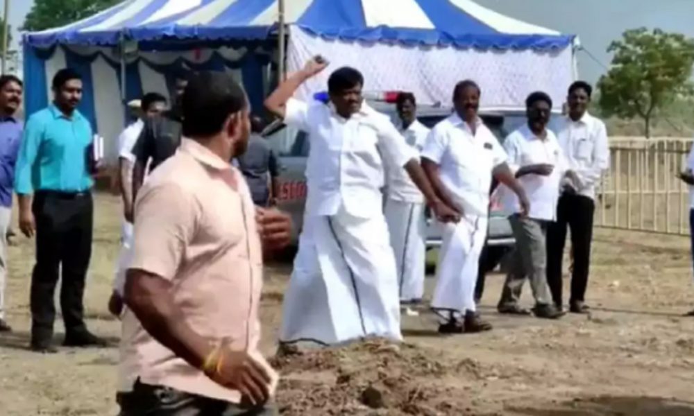 TN: DMK minister’s arrogance on camera, hurls stone at him for delay in brining chair for him (VIDEO)