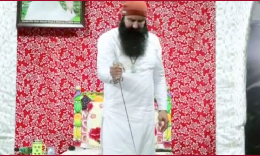 Currently, out on parole, Rape convict Gurmeet Ram Rahim cuts cake with sword, video goes viral