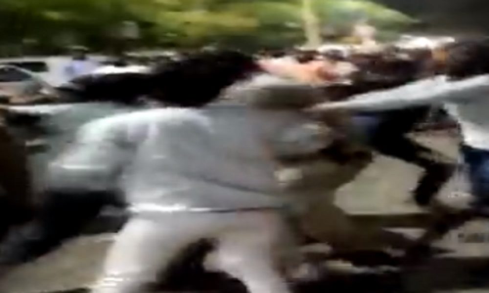 Miscreants clash with police, seen nabbing cops by collar in VIRAL video