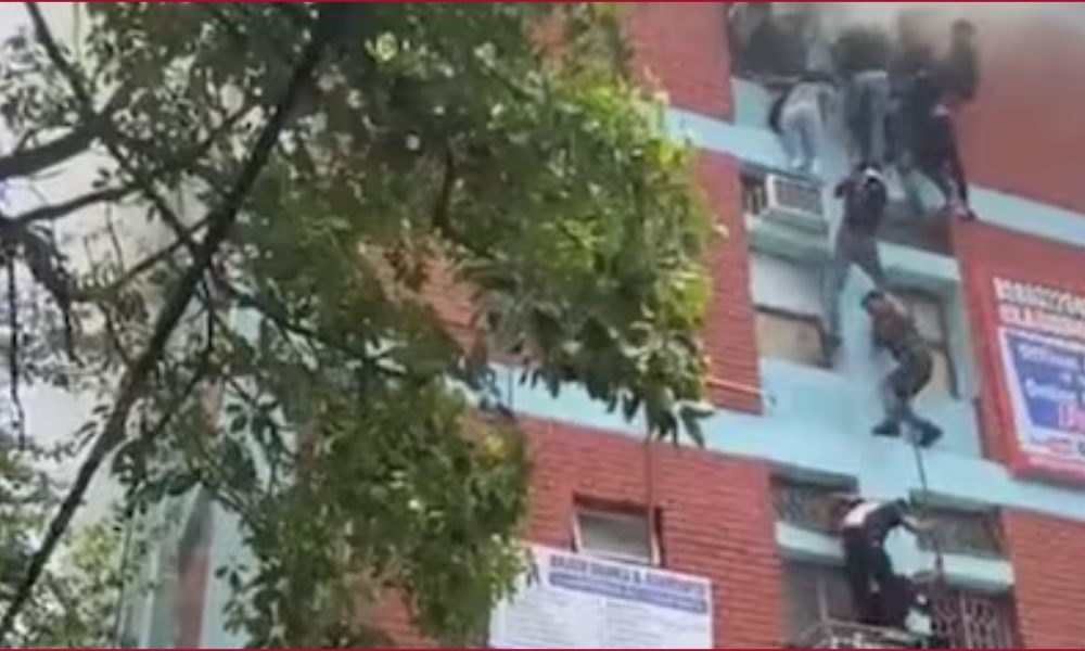 Fire in a building in Delhi’s Mukherjee Nagar, students jump to save lives (VIDEO)