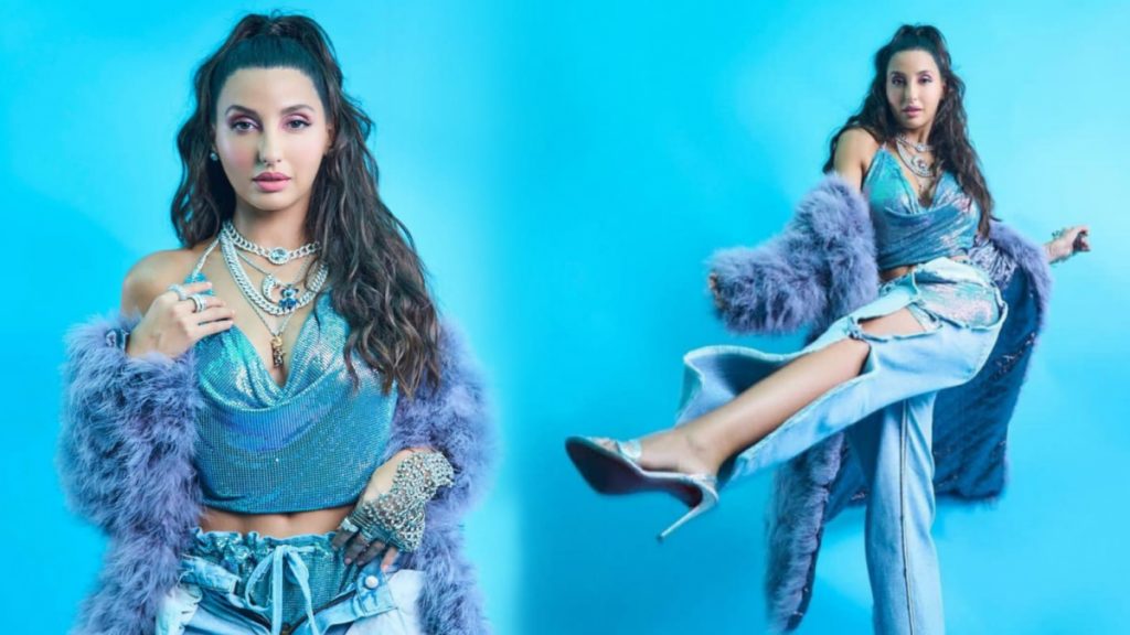 Nora Fatehi Channels Princess Jasmine Vibes in Stunning Blue Fur Coat and Denim Jeans!