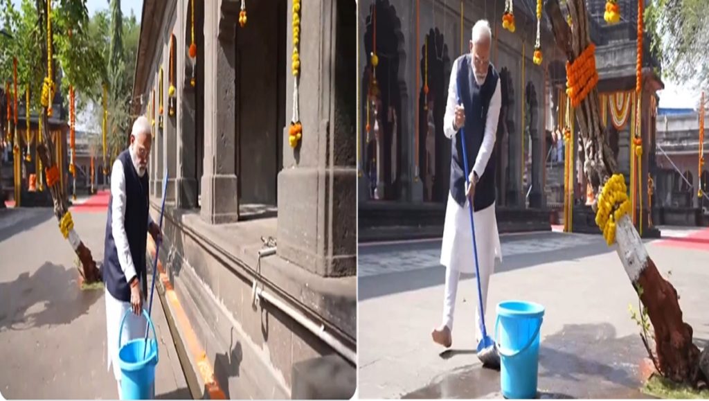 PM Modi - cleaning temple