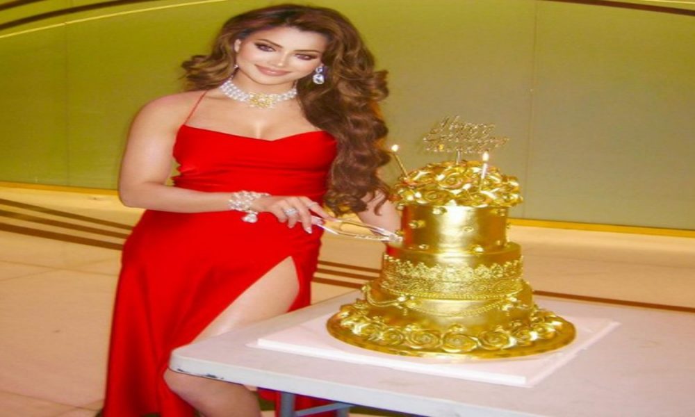 Urvashi Rautela sets world record on her Birthday by cutting 24 carate gold cake worth Rs 3 crores