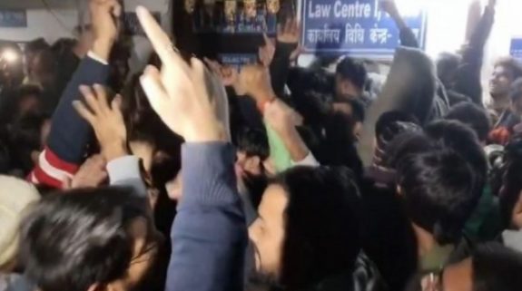 Students protest outside DU Law Faculty demanding extension of exams; blocked dean escorted by police